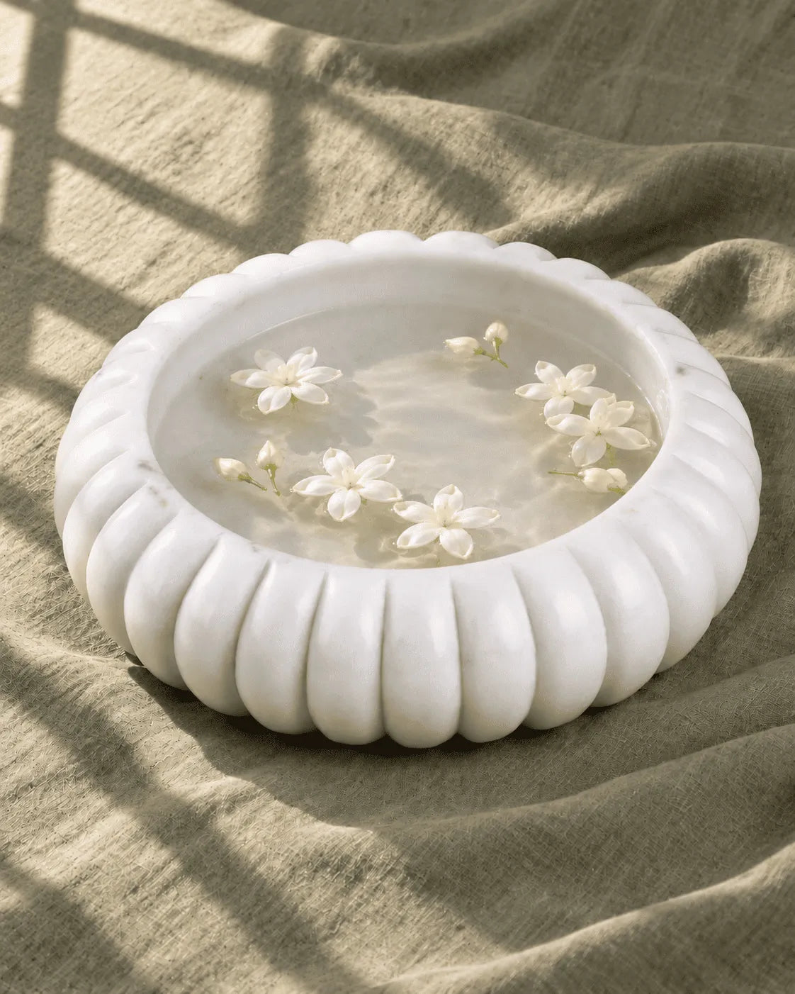 Ribbed Marble Urli Bowl with Brass Diya